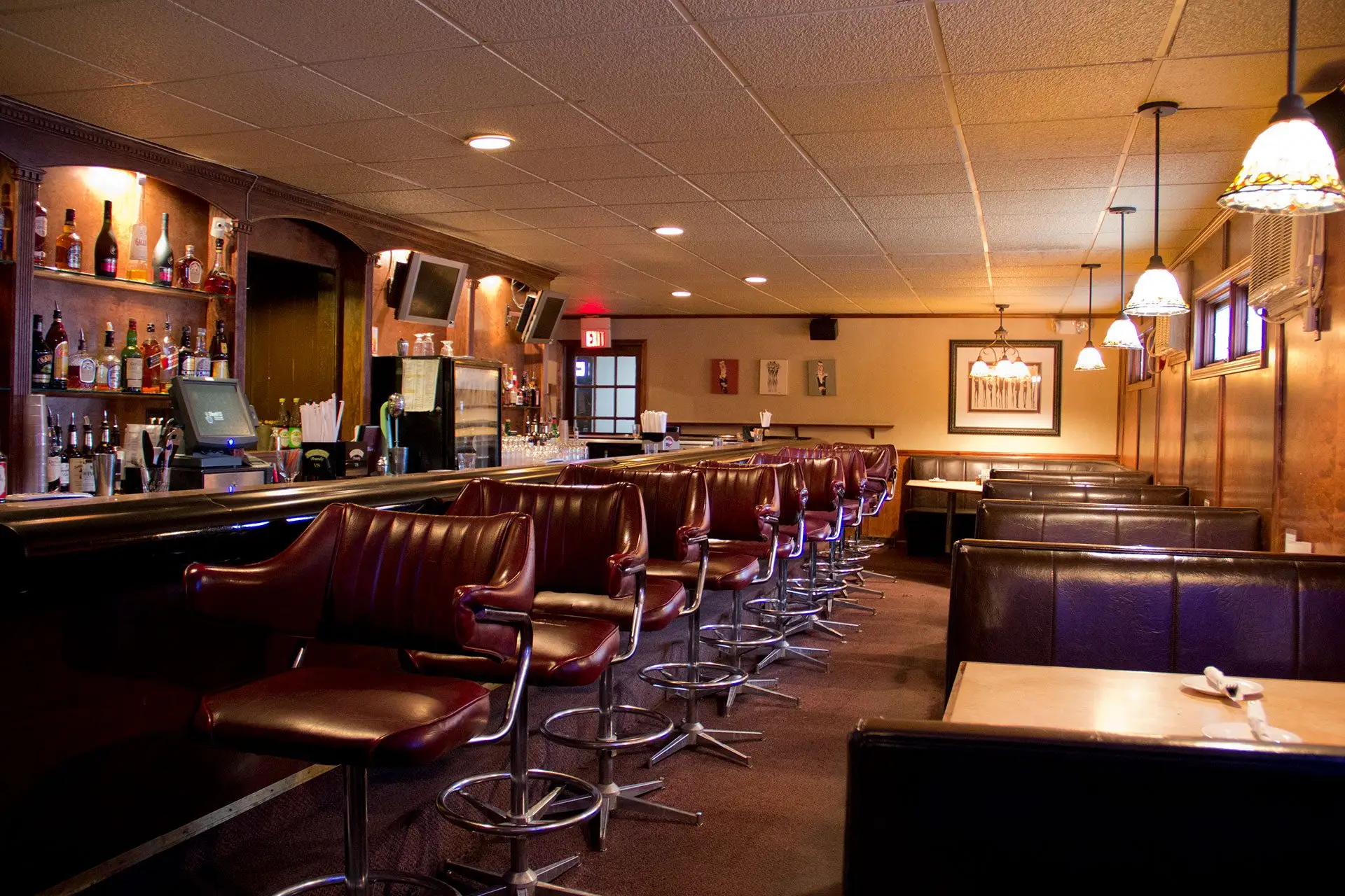 Booths and barstools and Dino's Restaurant