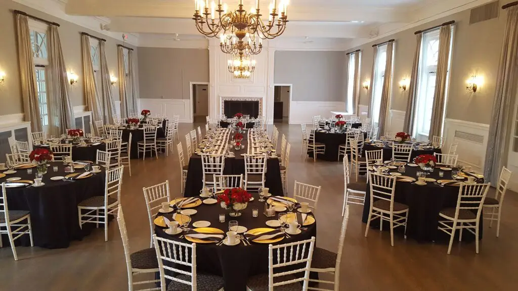 Tables set for a corporate meeting in the Ballroom at Manakiki Golf Course